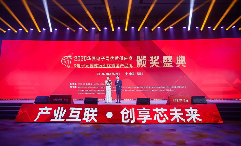 man and woman standing on stage